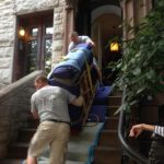 moving-a-grand-piano-down-the-stairs
