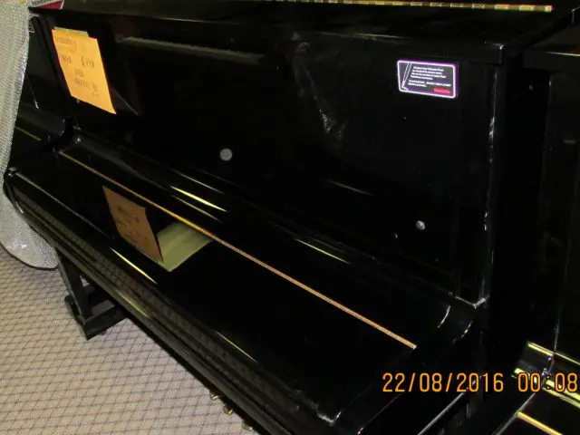 Black Yamaha 10A upright piano