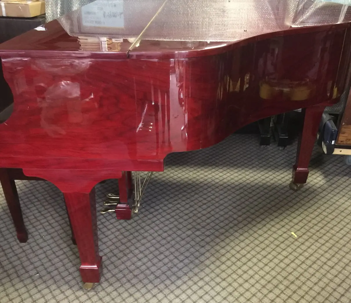 Used red Otto grand piano